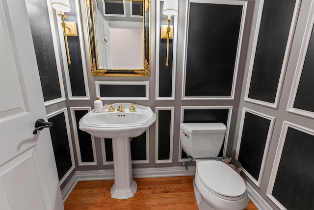 4047 Scenic Rd, Jackson, WI 53037 - bathroom with toilet and wood finished floors