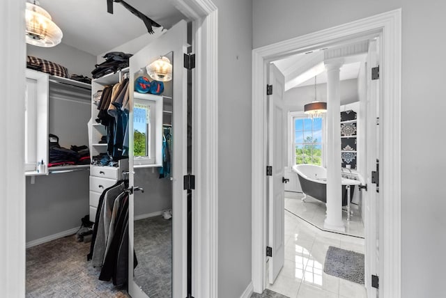4047 Scenic Rd, Jackson, WI 53037 - laundry room with baseboards and ornate columns