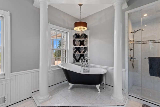 4047 Scenic Rd, Jackson, WI 53037 - full bathroom with ornate columns, a freestanding tub, a stall shower, and wainscoting