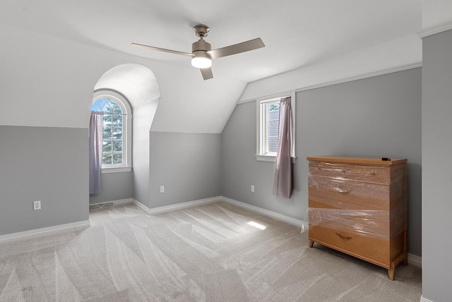4047 Scenic Rd, Jackson, WI 53037 - additional living space with ceiling fan, vaulted ceiling, and light colored carpet