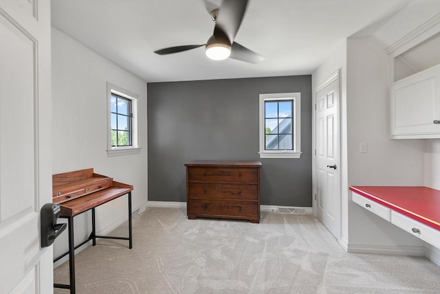 4047 Scenic Rd, Jackson, WI 53037 - office with healthy amount of natural light, ceiling fan, and light carpet