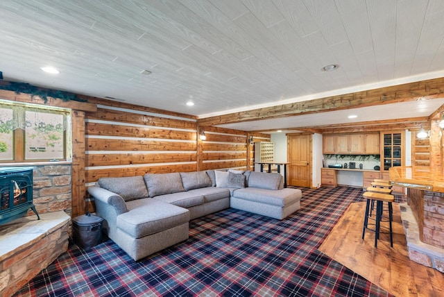 4047 Scenic Rd, Jackson, WI 53037 - living area with a wood stove, recessed lighting, and wooden ceiling