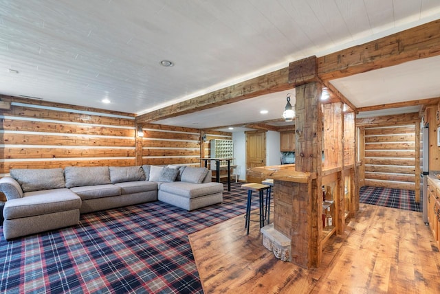 4047 Scenic Rd, Jackson, WI 53037 - living room with log walls, recessed lighting, light wood-type flooring, and wood walls