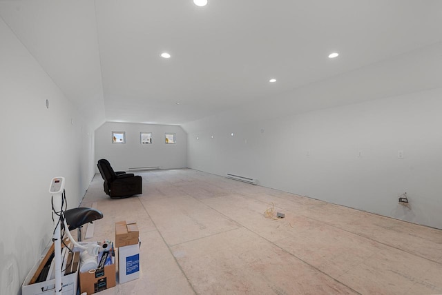 4047 Scenic Rd, Jackson, WI 53037 - unfurnished room featuring a baseboard radiator, recessed lighting, and vaulted ceiling