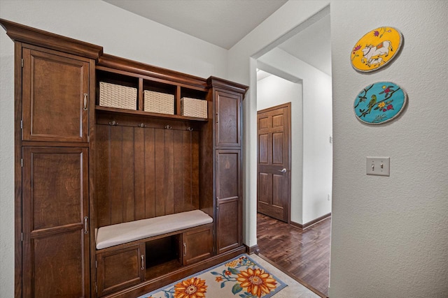 10870 N Spartan Cir, Mequon, WI 53097 - mudroom featuring wood finished floors and a textured wall
