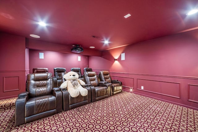 10870 N Spartan Cir, Mequon, WI 53097 - carpeted home theater room with a decorative wall, recessed lighting, and a wainscoted wall
