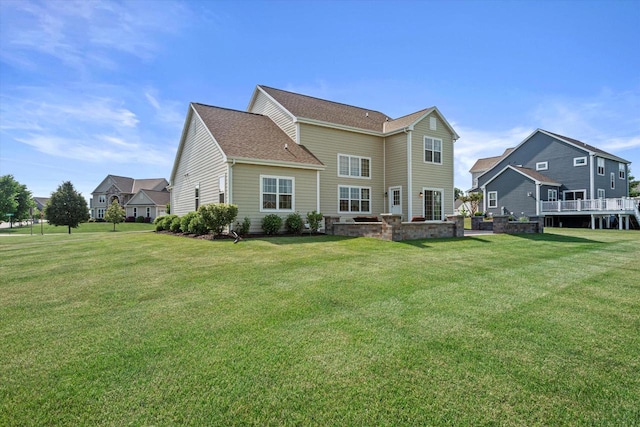 10870 N Spartan Cir, Mequon, WI 53097 - rear view of house featuring a yard