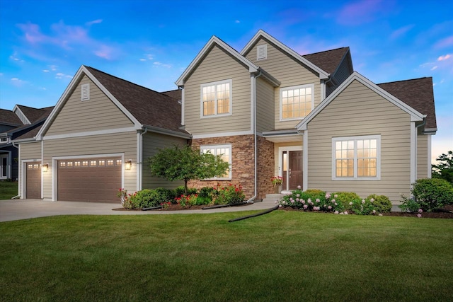 10870 N Spartan Cir, Mequon, WI 53097 - traditional-style house featuring a front lawn, driveway, a garage, and roof with shingles