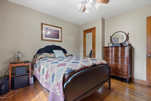 20903 W Main St, Lannon, WI 53046 - bedroom with wood finished floors and a ceiling fan