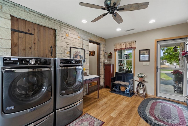 20903 W Main St, Lannon, WI 53046 - laundry room with washing machine and dryer, light wood finished floors, ceiling fan, and recessed lighting