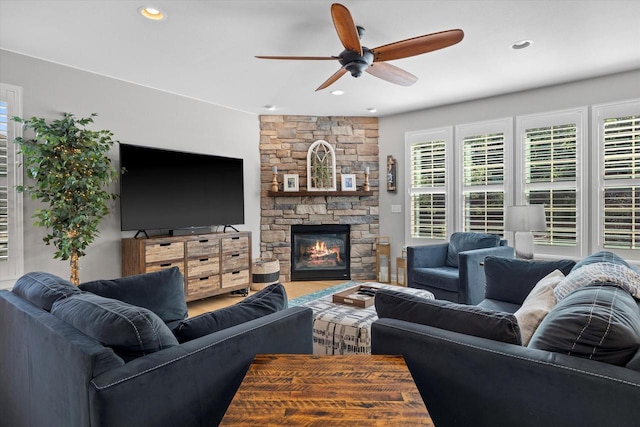 8061 S River Ln, Franklin, WI 53132 - living room with a ceiling fan, plenty of natural light, a fireplace, and recessed lighting