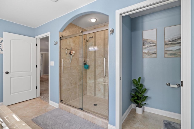 8061 S River Ln, Franklin, WI 53132 - bathroom featuring a shower stall and tile patterned flooring