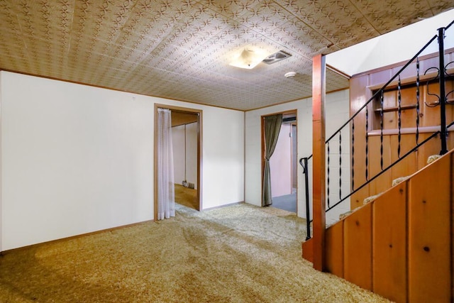1313 S 26th St, Manitowoc, WI 54220 - carpeted empty room featuring stairway