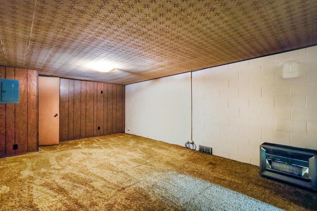 1313 S 26th St, Manitowoc, WI 54220 - finished basement featuring carpet flooring, electric panel, wood walls, and concrete block wall