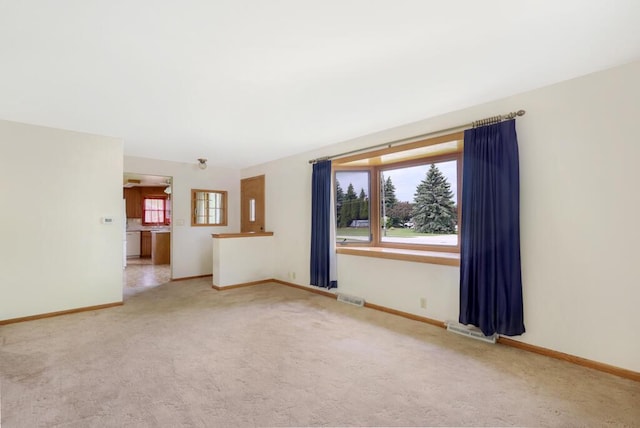 1313 S 26th St, Manitowoc, WI 54220 - unfurnished room with baseboards and carpet flooring