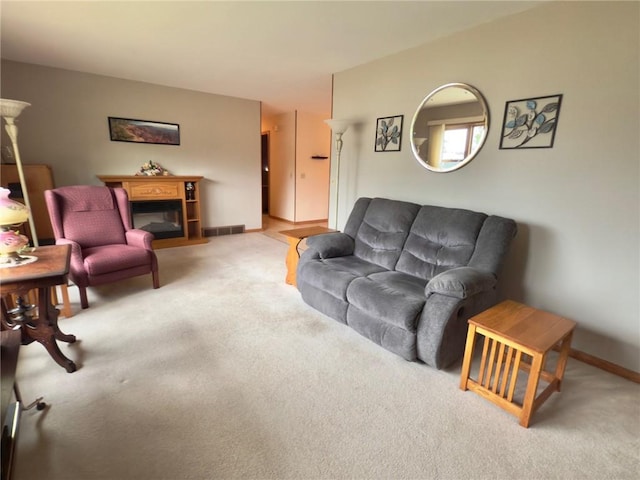 1623 Edgewood Ln, Eau Claire, WI 54703 - living room with carpet floors and a glass covered fireplace