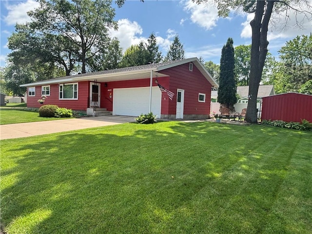 1623 Edgewood Ln, Eau Claire, WI 54703 - ranch-style house featuring an attached garage, a front lawn, and concrete driveway