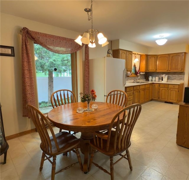 1623 Edgewood Ln, Eau Claire, WI 54703 - dining space with a chandelier and light floors