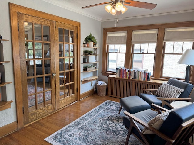 6309 W Mckinley Ave, Wauwatosa, WI 53213 - living area featuring a ceiling fan, crown molding, wood finished floors, and french doors