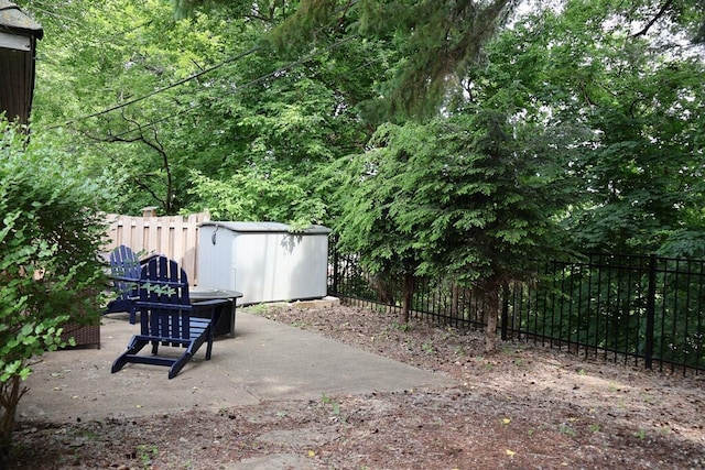 6309 W Mckinley Ave, Wauwatosa, WI 53213 - fenced backyard with a storage shed and a patio area