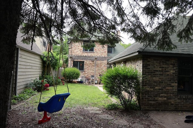 6309 W Mckinley Ave, Wauwatosa, WI 53213 - view of grassy yard with a pergola