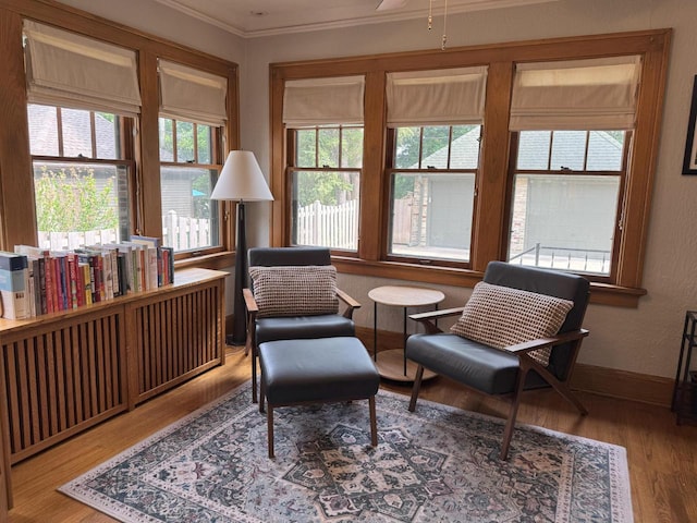 6309 W Mckinley Ave, Wauwatosa, WI 53213 - sitting room with wood finished floors and crown molding