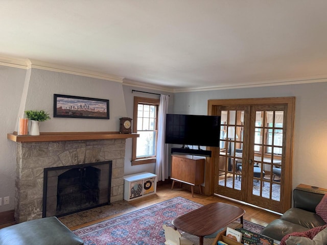 6309 W Mckinley Ave, Wauwatosa, WI 53213 - living area with wood finished floors, french doors, crown molding, and a fireplace