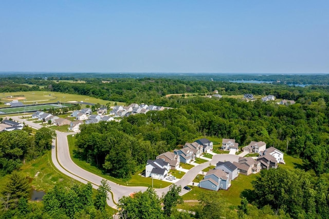 309 Paradise Ct, Hartland, WI 53029 - aerial perspective of suburban area featuring a heavily wooded area
