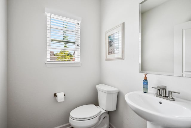 309 Paradise Ct, Hartland, WI 53029 - bathroom featuring a sink and toilet