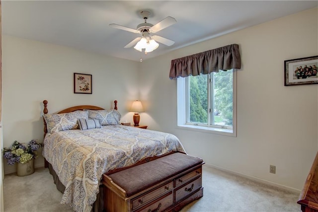 3614 Greendale Ct, Eau Claire, WI 54701 - bedroom with light colored carpet and a ceiling fan