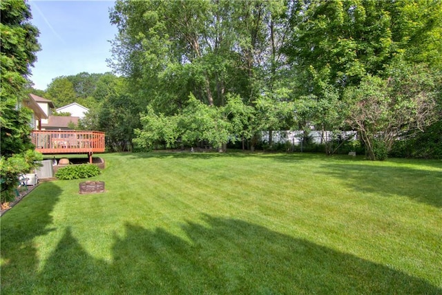 3614 Greendale Ct, Eau Claire, WI 54701 - view of green lawn with a wooden deck