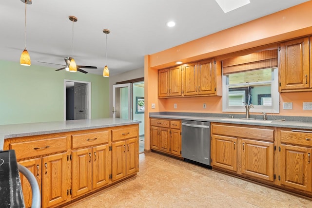 1635 N 21st St, Manitowoc, WI 54220 - kitchen with stainless steel dishwasher, stove, decorative light fixtures, brown cabinets, and recessed lighting