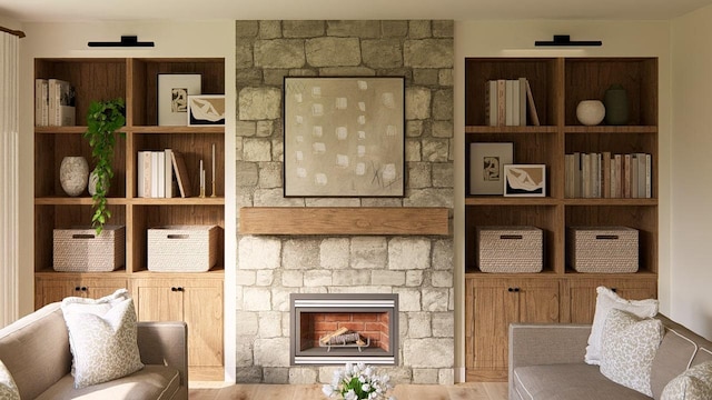 905 Westbridge Ct, Waunakee, WI 53597 - unfurnished living room with a fireplace and wood finished floors