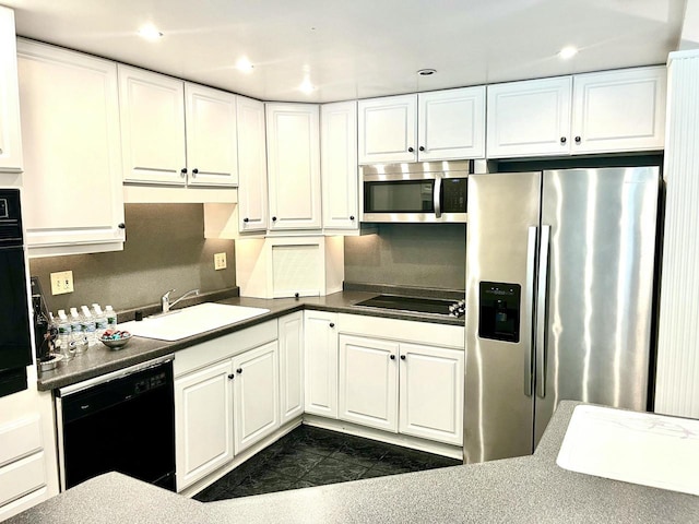 2200 W Good Hope Rd Unit 115, Glendale, WI 53209 - kitchen with black appliances, white cabinetry, backsplash, recessed lighting, and dark countertops