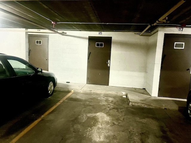 2200 W Good Hope Rd Unit 115, Glendale, WI 53209 - parking garage with concrete block wall