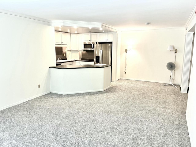 2200 W Good Hope Rd Unit 115, Glendale, WI 53209 - kitchen with appliances with stainless steel finishes, ornamental molding, dark countertops, white cabinetry, and light colored carpet
