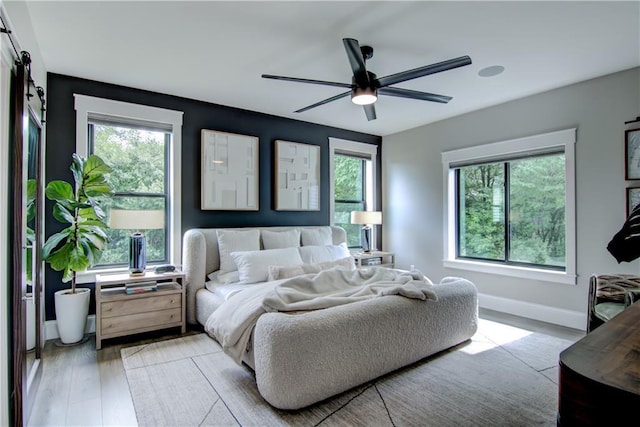 6649 Hope Ln, Eau Claire, WI 54701 - bedroom featuring wood finished floors and a ceiling fan