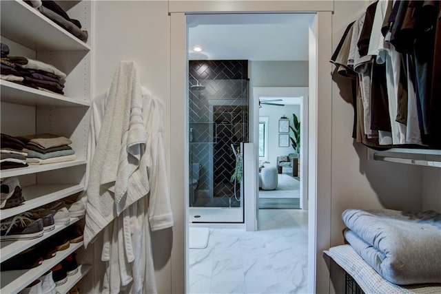 6649 Hope Ln, Eau Claire, WI 54701 - spacious closet with marble look tiles and ceiling fan