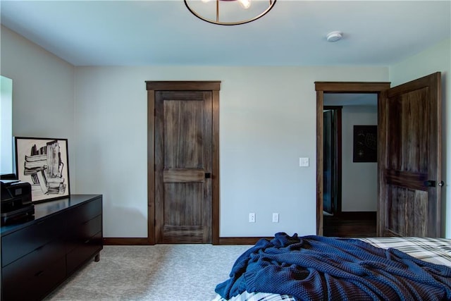 6649 Hope Ln, Eau Claire, WI 54701 - bedroom featuring light carpet and baseboards