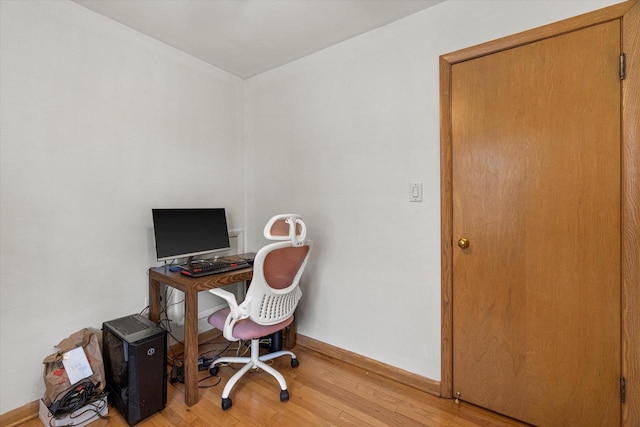 9230 W Auer Ave, Milwaukee, WI 53222 - office area featuring light wood-style flooring and baseboards