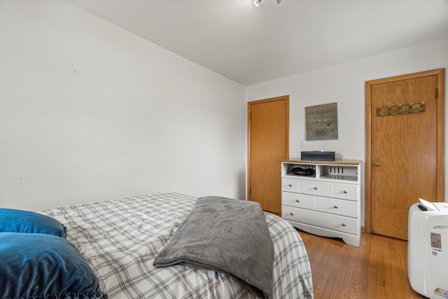 9230 W Auer Ave, Milwaukee, WI 53222 - bedroom featuring light wood-type flooring