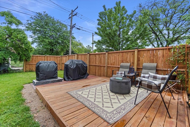 9230 W Auer Ave, Milwaukee, WI 53222 - wooden deck with grilling area and a fenced backyard