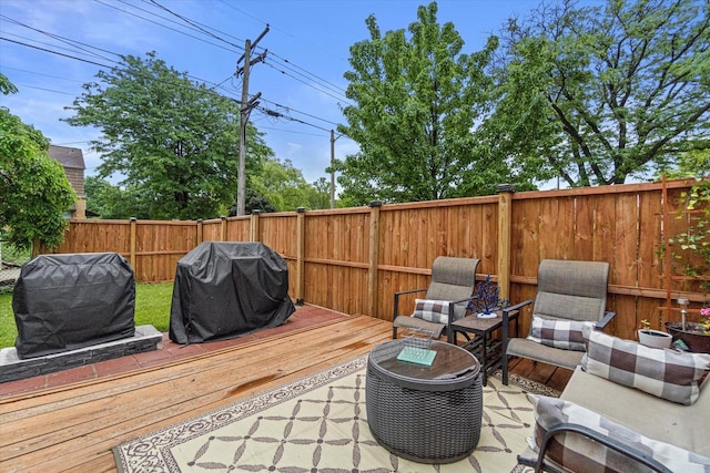 9230 W Auer Ave, Milwaukee, WI 53222 - wooden deck featuring grilling area and a fenced backyard