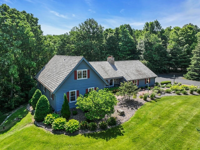 1840 Candlewood Ln, Richfield, WI 53076 - view of front of home featuring a chimney and a front lawn