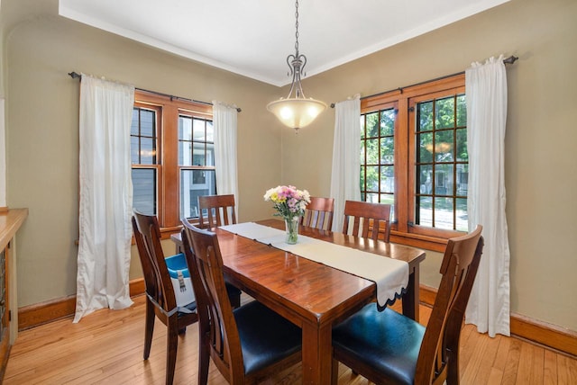 1441 N 66th St, Wauwatosa, WI 53213 - dining area with light wood-style floors and baseboards