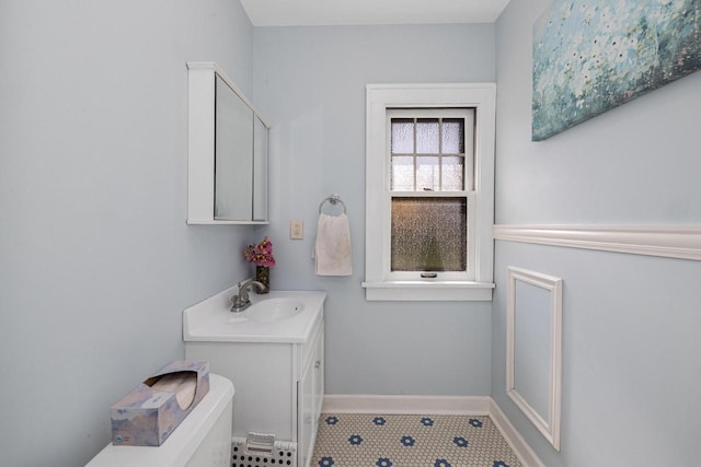 1441 N 66th St, Wauwatosa, WI 53213 - bathroom with vanity and tile patterned floors