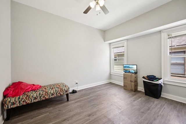 3936 N 14th St Unit 3938, Milwaukee, WI 53206 - sitting room featuring wood finished floors and ceiling fan