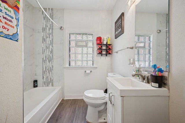 3936 N 14th St Unit 3938, Milwaukee, WI 53206 - bathroom featuring vanity, wood finished floors, and bathing tub / shower combination