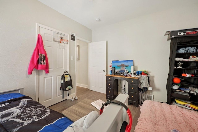 3936 N 14th St Unit 3938, Milwaukee, WI 53206 - bedroom with wood finished floors