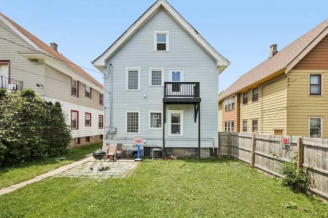 3936 N 14th St Unit 3938, Milwaukee, WI 53206 - rear view of property featuring a patio area and a balcony
